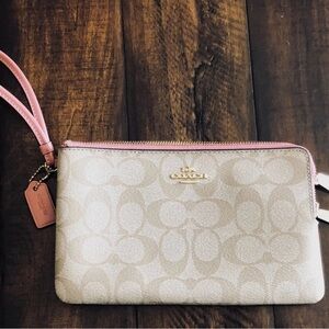 Coach double zip wallet in signature canvas wristlet tan/pink